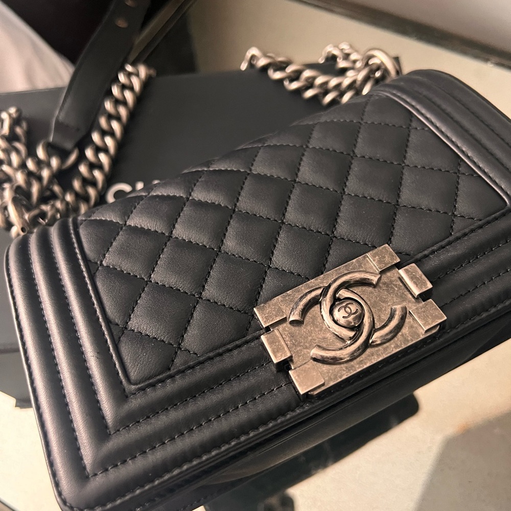 New Condition Authentic Chanel black Gun medal chain handbag with box